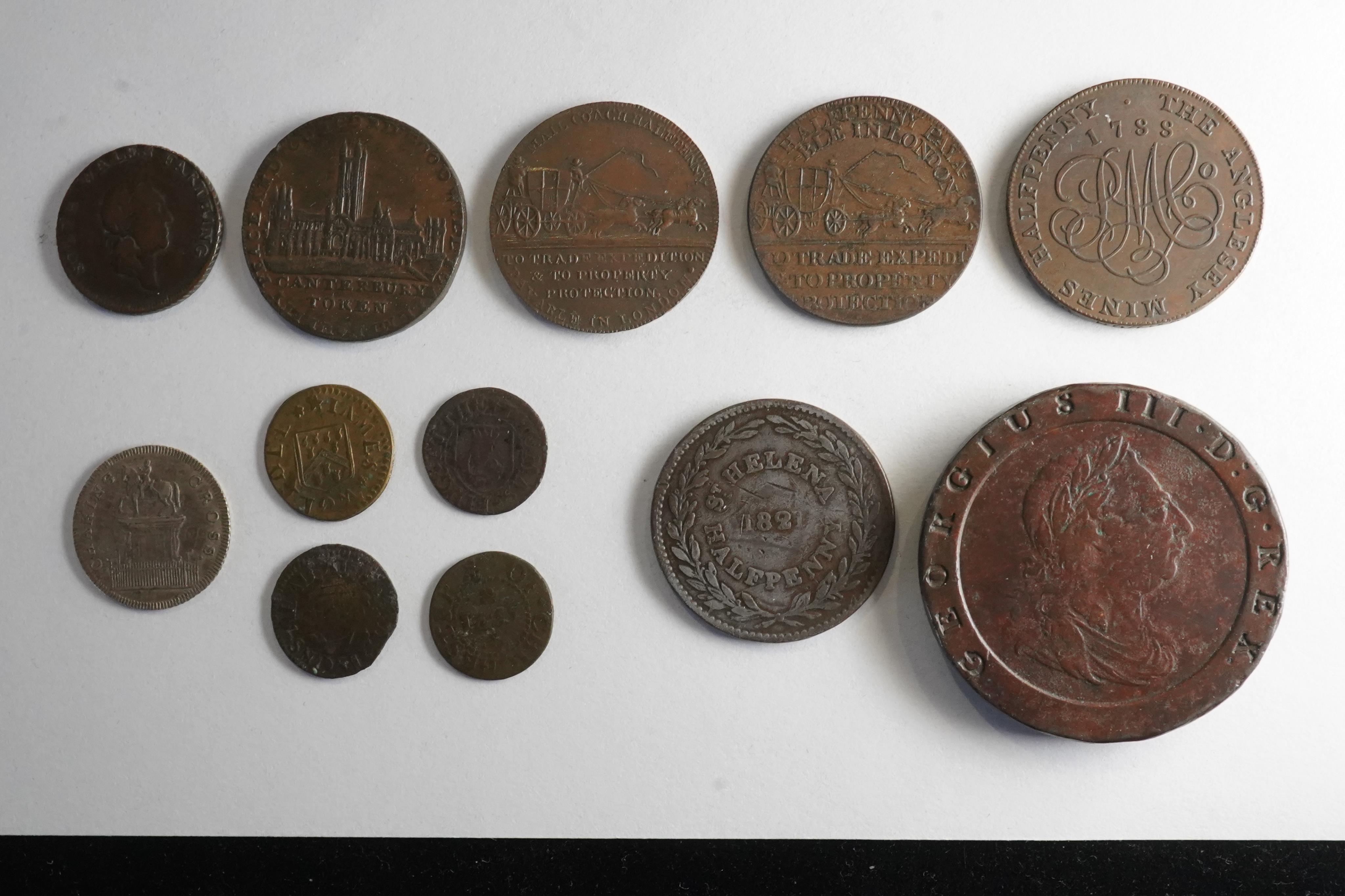 British AE coins and tokens;, South Wales Farthing, Canterbury halfpenny, 1794, dark toned EF, The Anglesey mines half penny 1788, Two mail coach halfpennies, both inscribed to J. Palmer Esquire, 1790s, both dark toned a